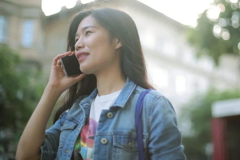 Smart hits zero dropped calls in latest NTC tests asian woman on phone