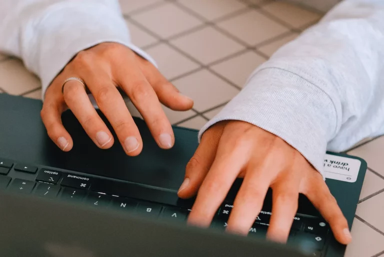 child hands on computer