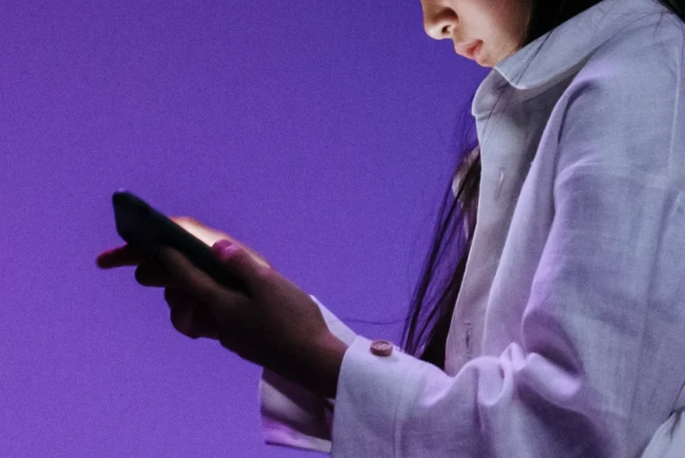 Globe, Smart, PLDT move to block violent sites, protect kids online child looking at a smartphone