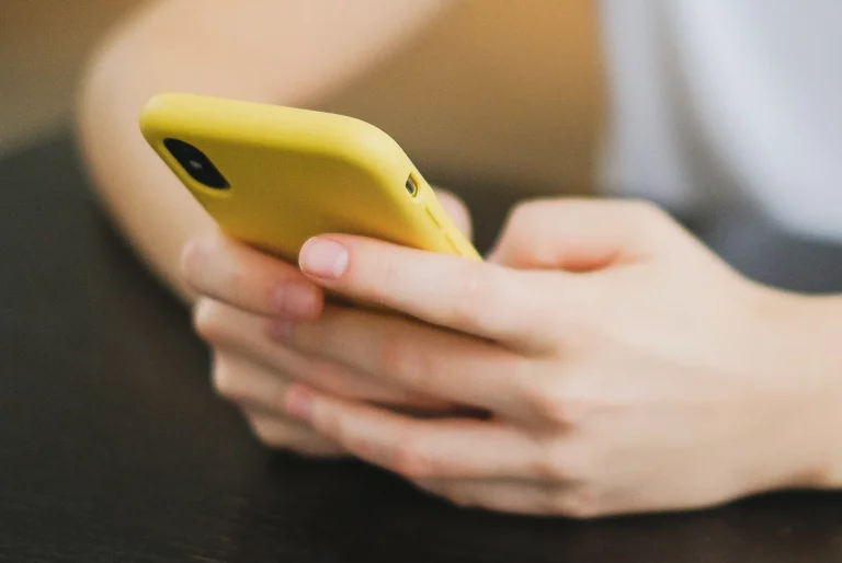 Meta adds stricter rules to Teen Accounts for safer use in PH young person holding a smartphone